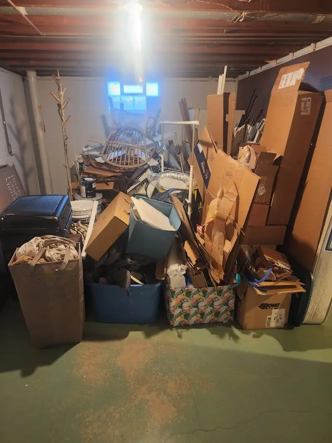 Roll-off dumpster container at job site for 2 Yard Dumpster Rental in Andover